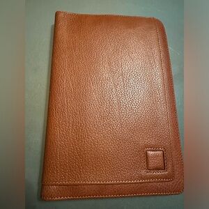 Genuine leather passport card holder.